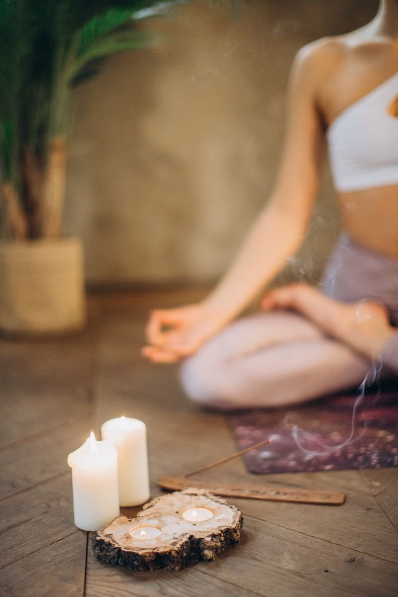 Yoga practitioner holding an outdoor posture in mountain surroundings